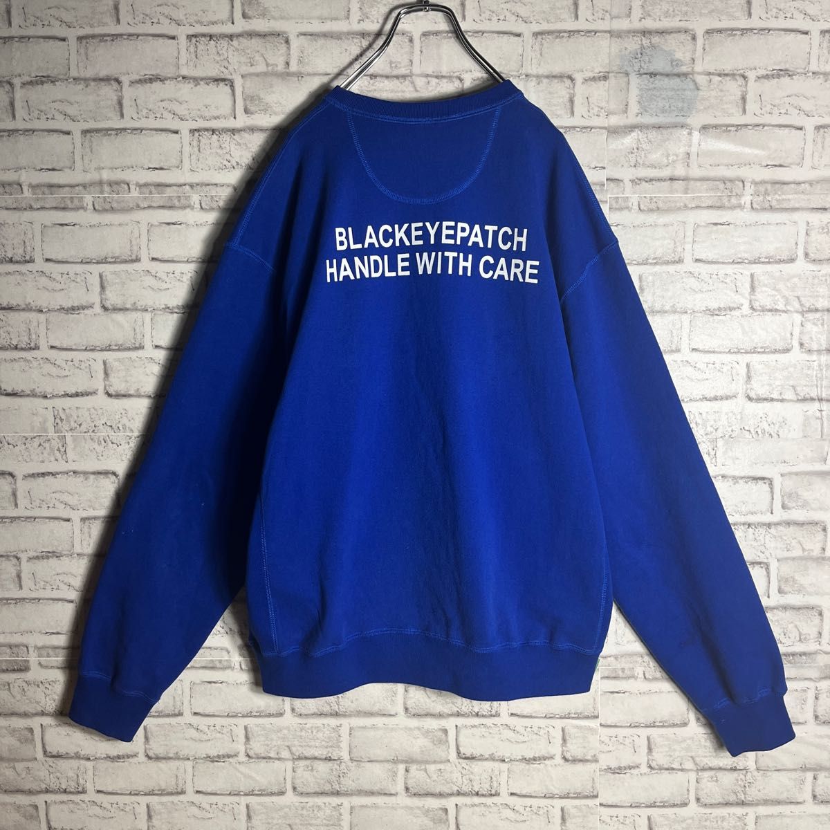 魅力の魅力のブラックアイパッチ取扱注意スウェットビッグロゴ刺繍