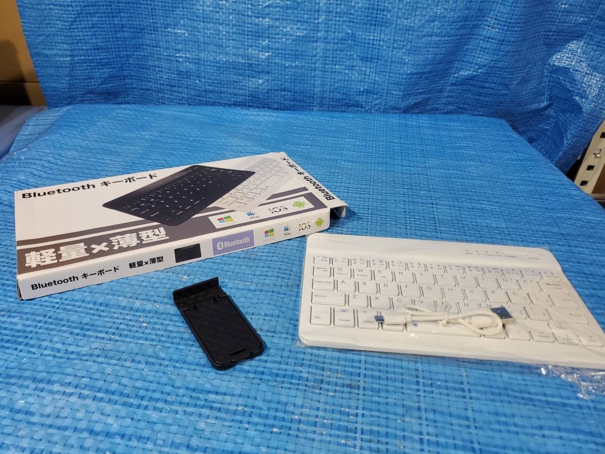 [値下げ] ★1000円即決! upbf 新品未使用 軽量小型 bluetooth keyboard win mac android iOS スタンド付き_画像1