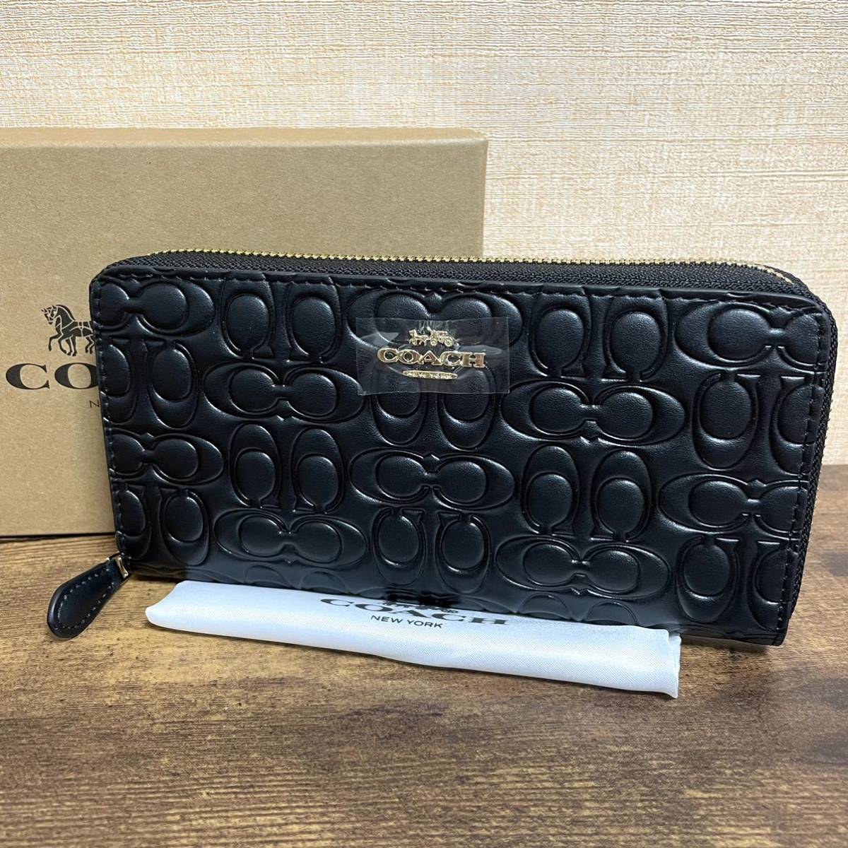 コーチ Coach財布エンボスド シグネチャー ラウンドファスナー 長財布