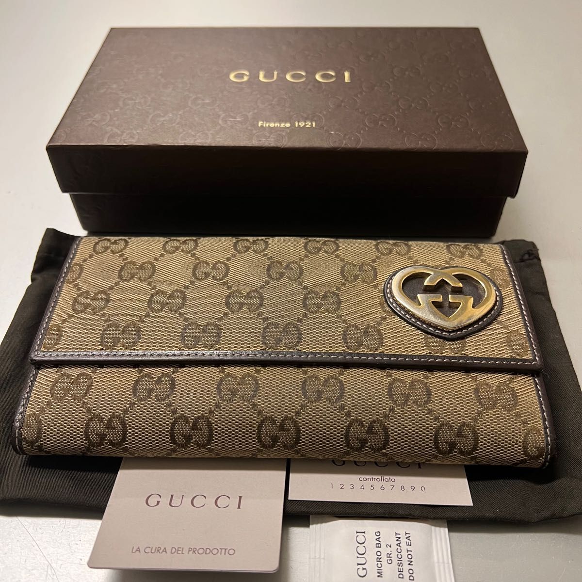 未使用に近い！　グッチ　GUCCI 財布　長財布　ラブリーハート　GGキャンバス