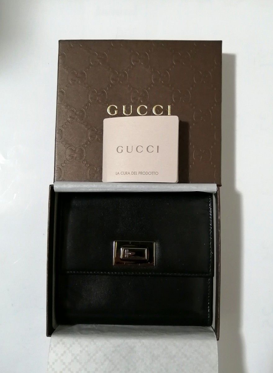 未使用】GUCCI グッチ 本革折り財布 黒 ターンロック メンズ