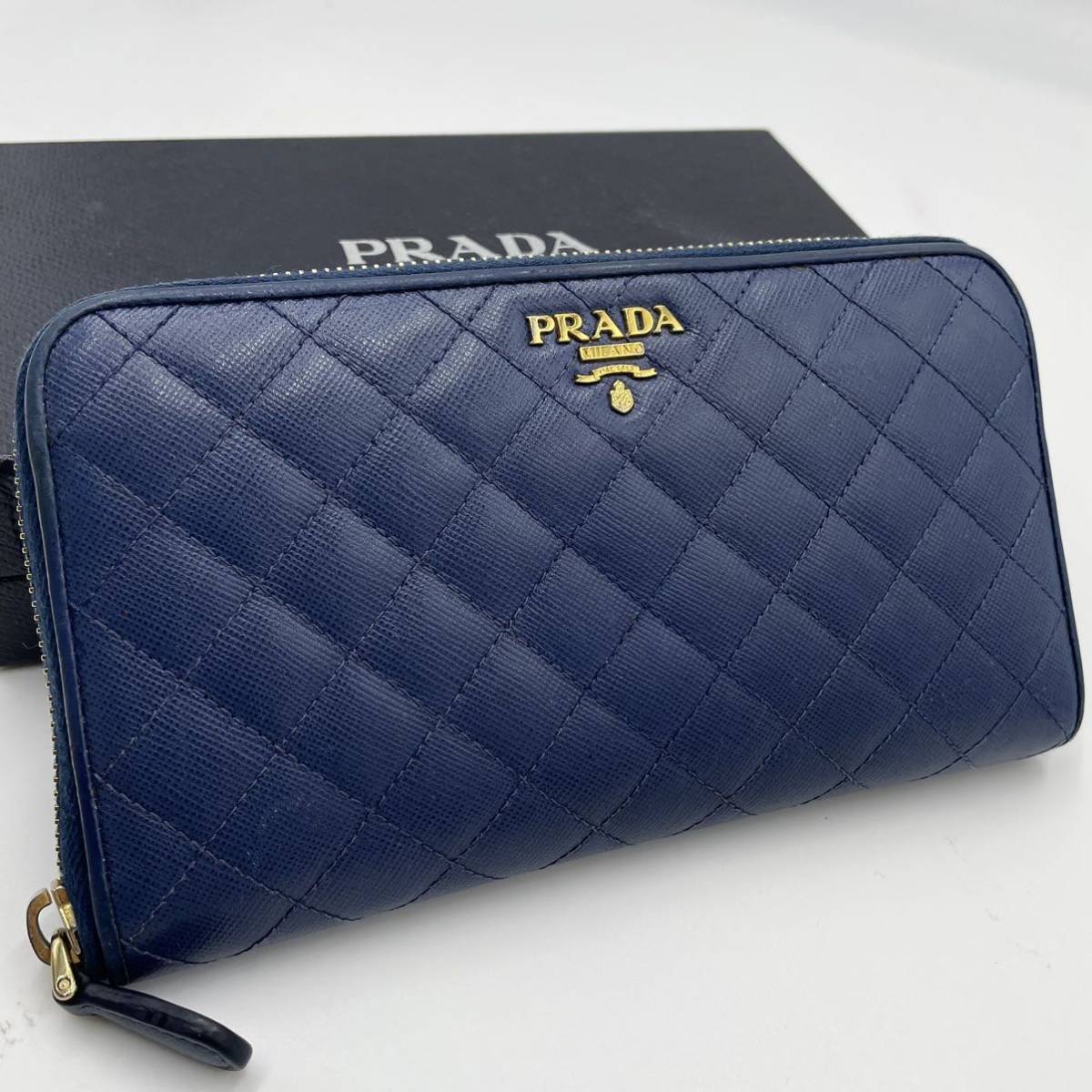 94%OFF!】 PRADA キルティング長財布 ブルー 3broadwaybistro.com