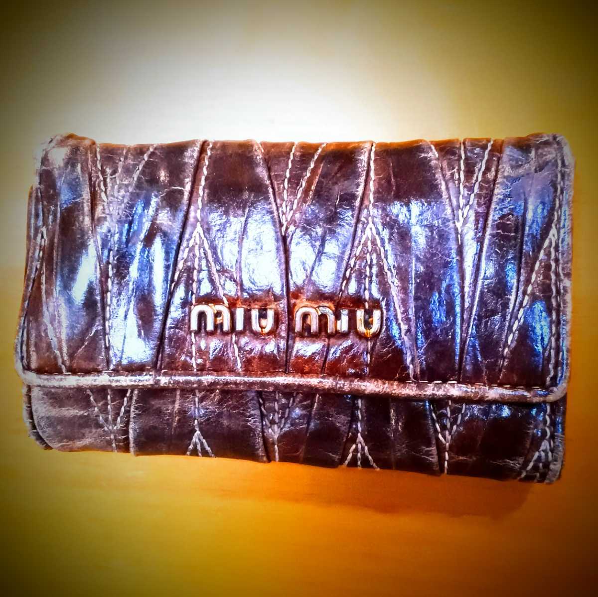 ミュウ ミュウ（Miu Miu）レディースブラウンオールシーズン材質（地金）：レザーW約17cm x H約10.5cmx D約1cm70g開閉式：スナップボタン