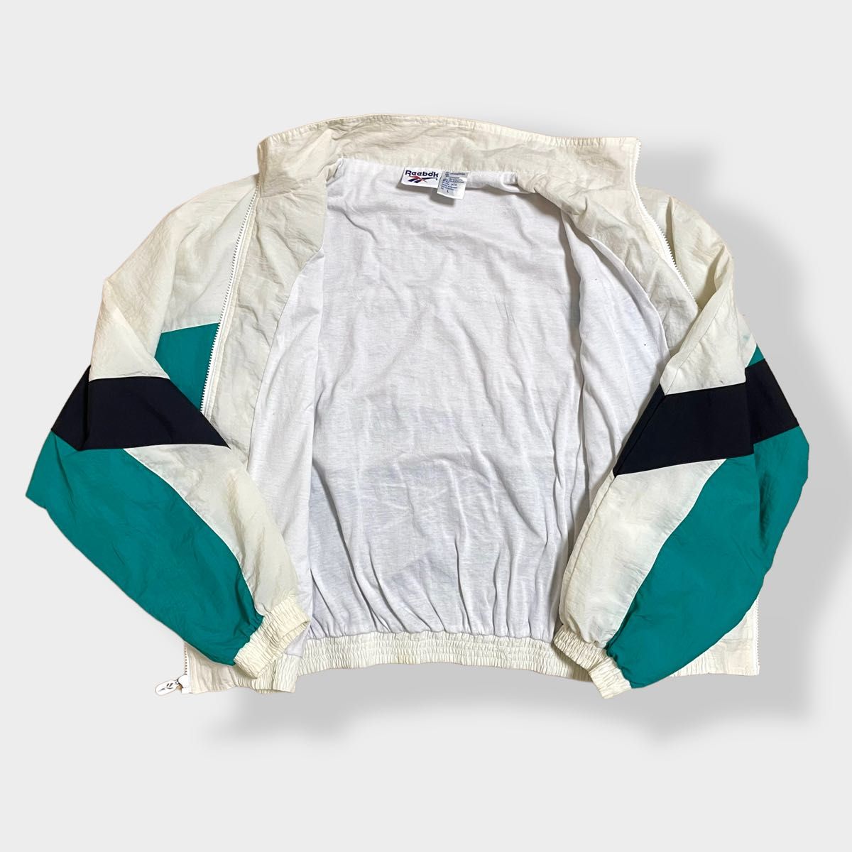 Reebok】90s 旧タグ ナイロンジャケット ジャンパー バックロゴ Reebok】90s 旧タグ ナイロンジャケット ジャンパー バックロゴ