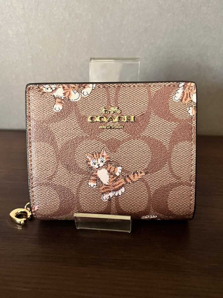スナップ ウォレット イン シグネチャー キャンバス 二つ折り財布 CC