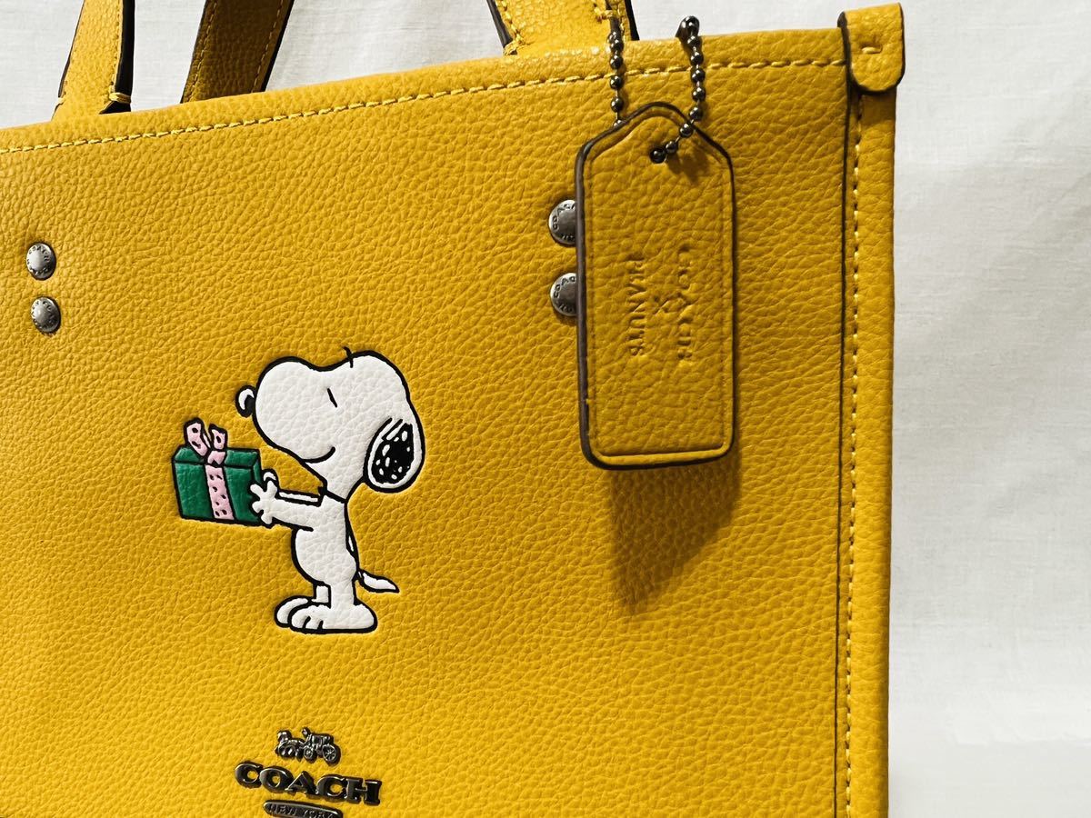 入荷予定商品 COACH コーチ PEANUTSコラボ トートバッグ デンプシー