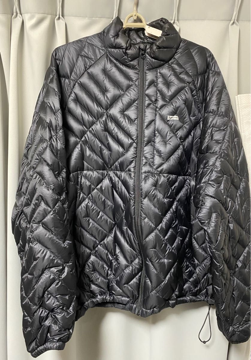 Supreme Spellout Quilted Down Jacket | sweatreno.com