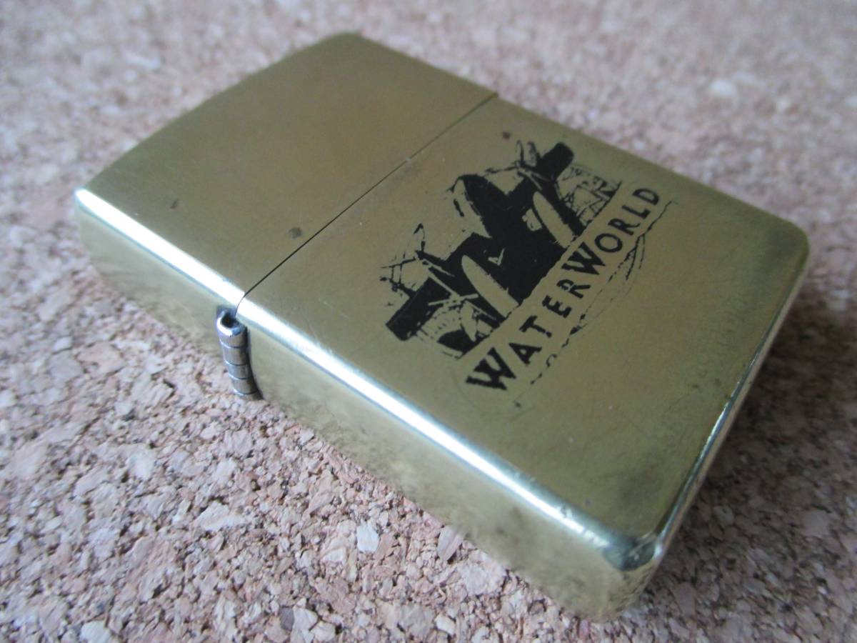 ZIPPO 『映画 WATER WORLD ウォーター ワールド』2001年8月製造 ケビン・コスナー 金色ソリッドブラス オイルライター ジッポー 廃版激レア