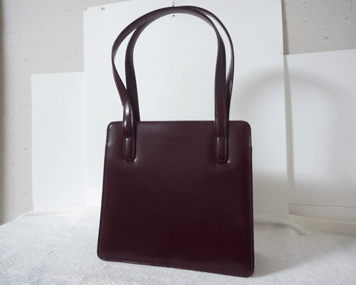 キャサリンハムネット　KATHARINE HAMNETT　レザー　赤茶系　がま口　ハンドバッグ　レディース