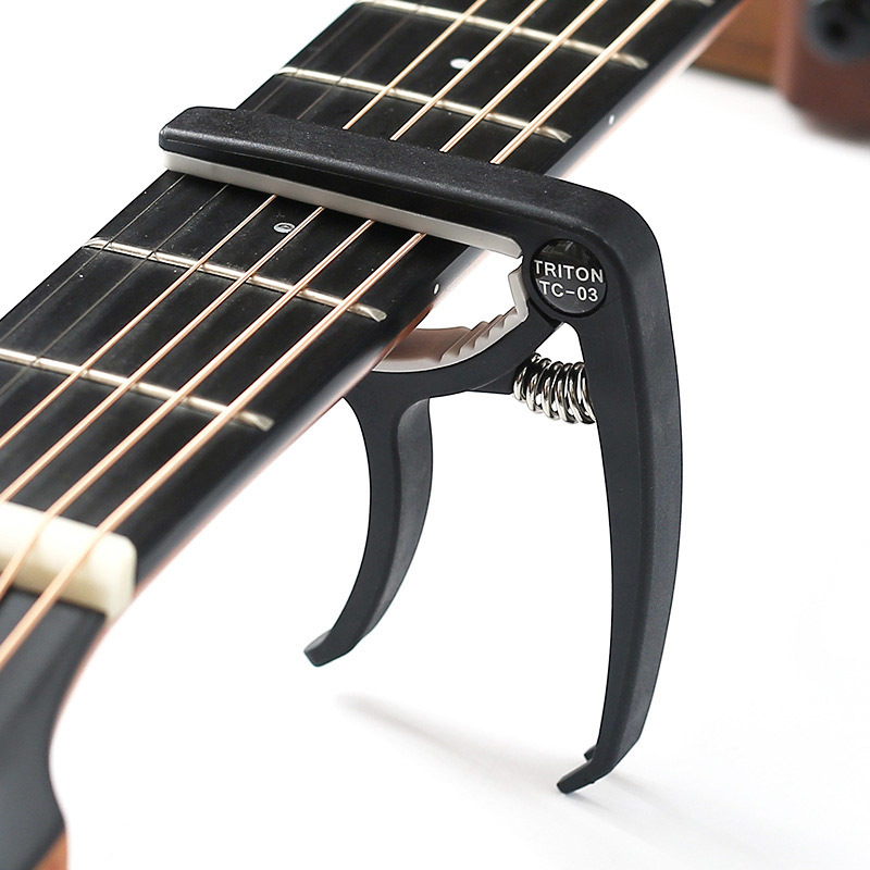 * 4 point set * capo ( black )& clip type guitar tuner ( battery entering ) & pick holder ( tea ) & pick (3 sheets )!