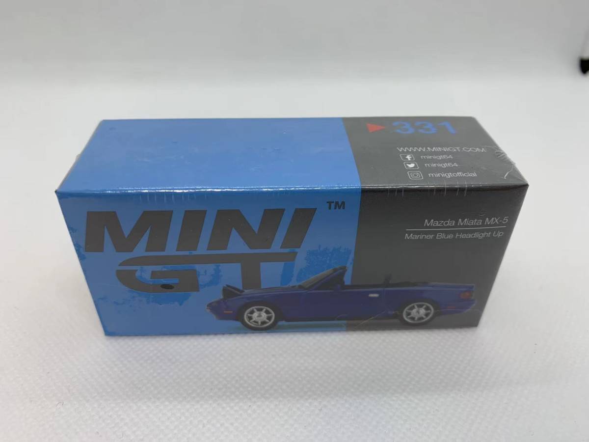 TSM 1/64 マツダ MINIGT Mazda Miata MX-5 (NA) Mariner Blue Headight Up LHD NO.331 J04-R-133_画像1