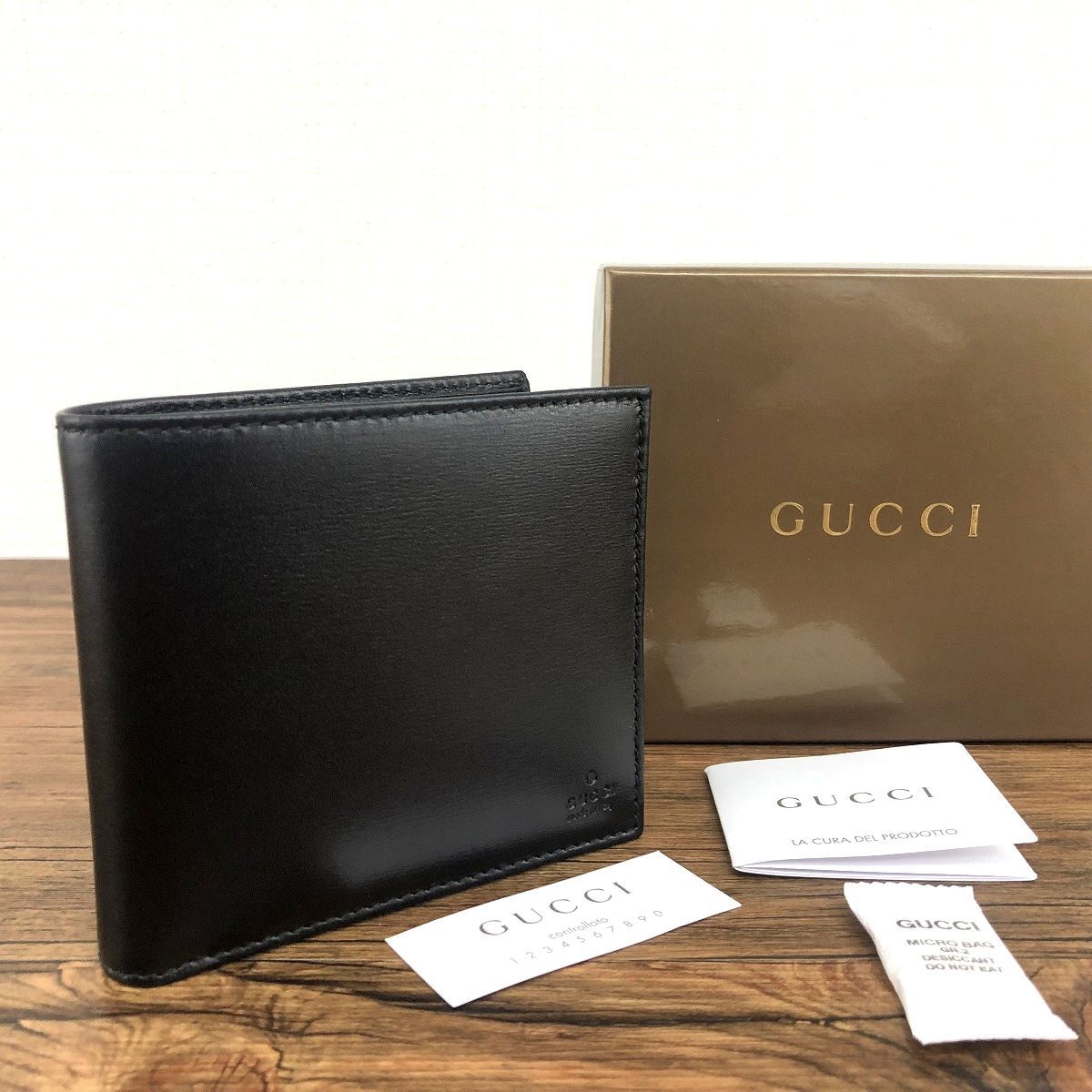 ☆送料無料☆ 極美品 GUCCI 二つ折り財布 04843 ブラック 箱付き 46