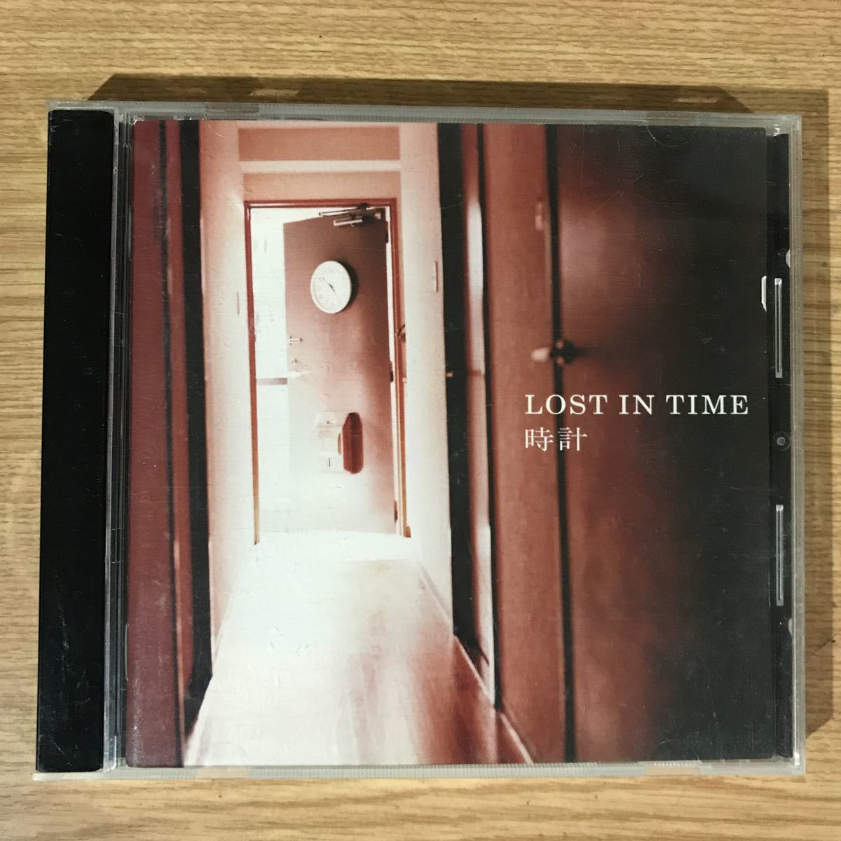(313)帯付 中古CD150円 LOST IN TIME 時計_画像1