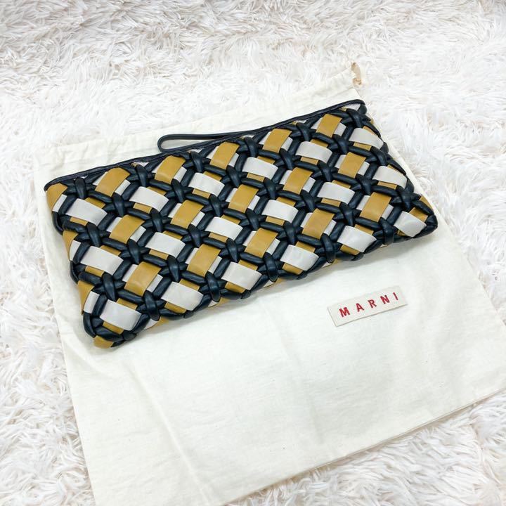  Marni .. san have on clutch bag yellow 