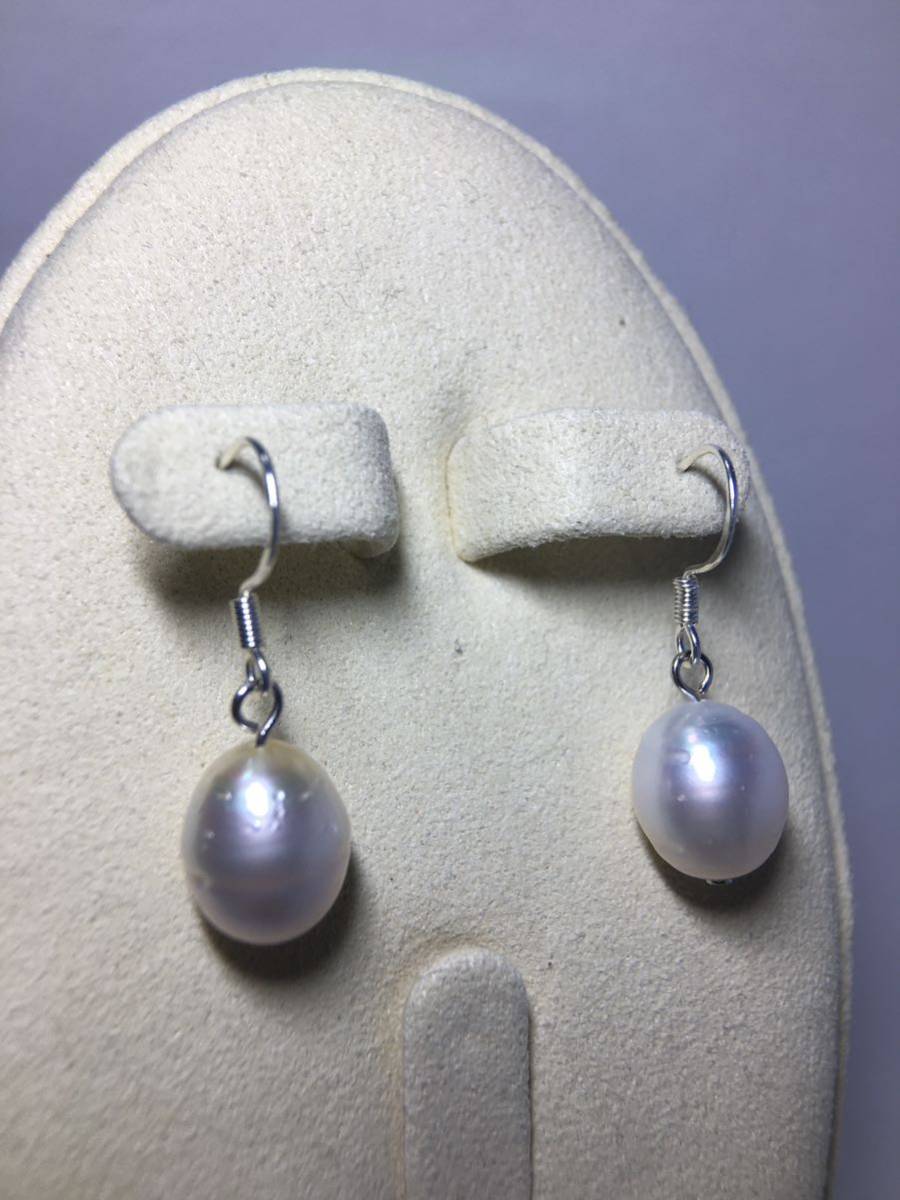 AB24 White Butterfly south . pearl ba lock pearl earrings 