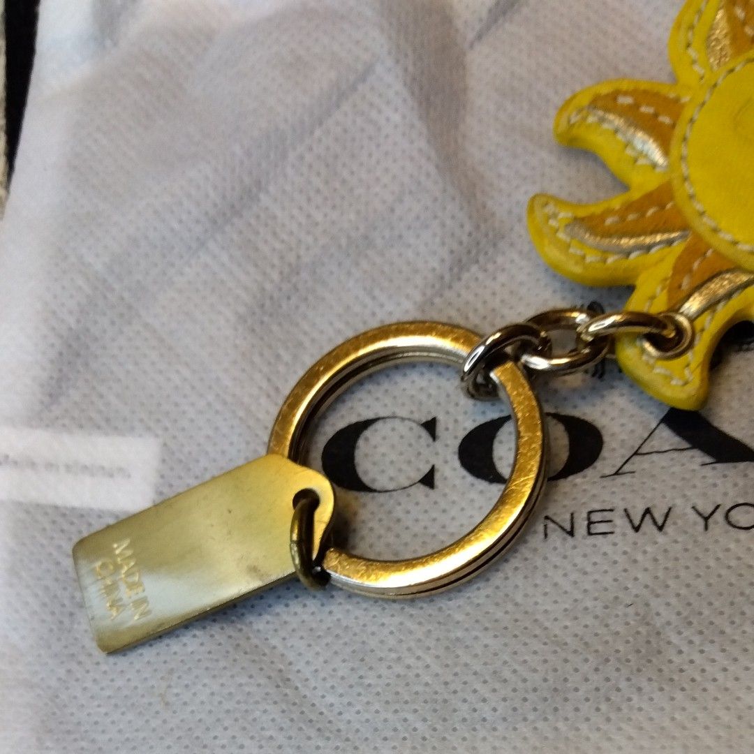 コーチ COACH 太陽モチーフ レザーキーホルダー/チャーム【美品 コーチ COACH 太陽モチーフ レザーキーホルダー/チャーム【美品