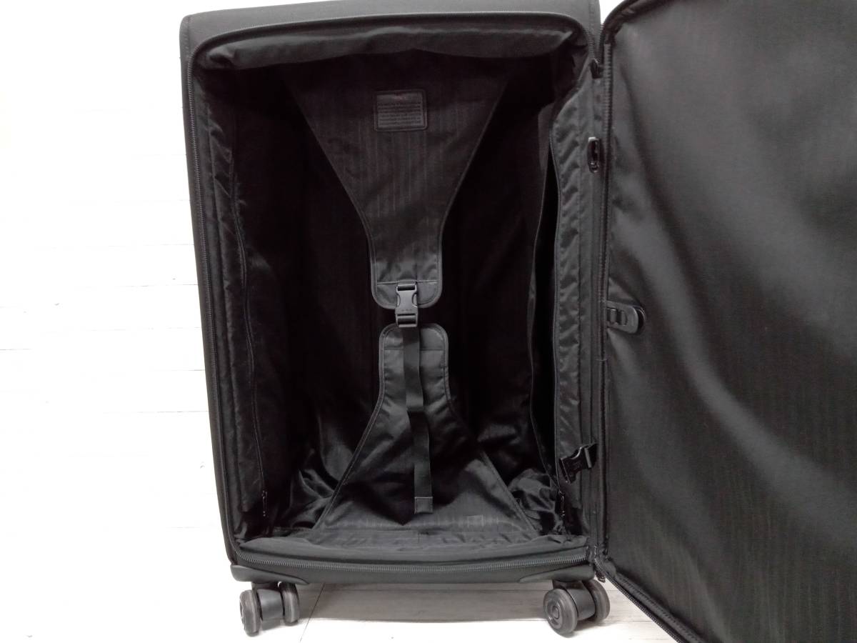 TUMI 22069DH Tumi suitcase 29 -inch black through year store receipt possible 