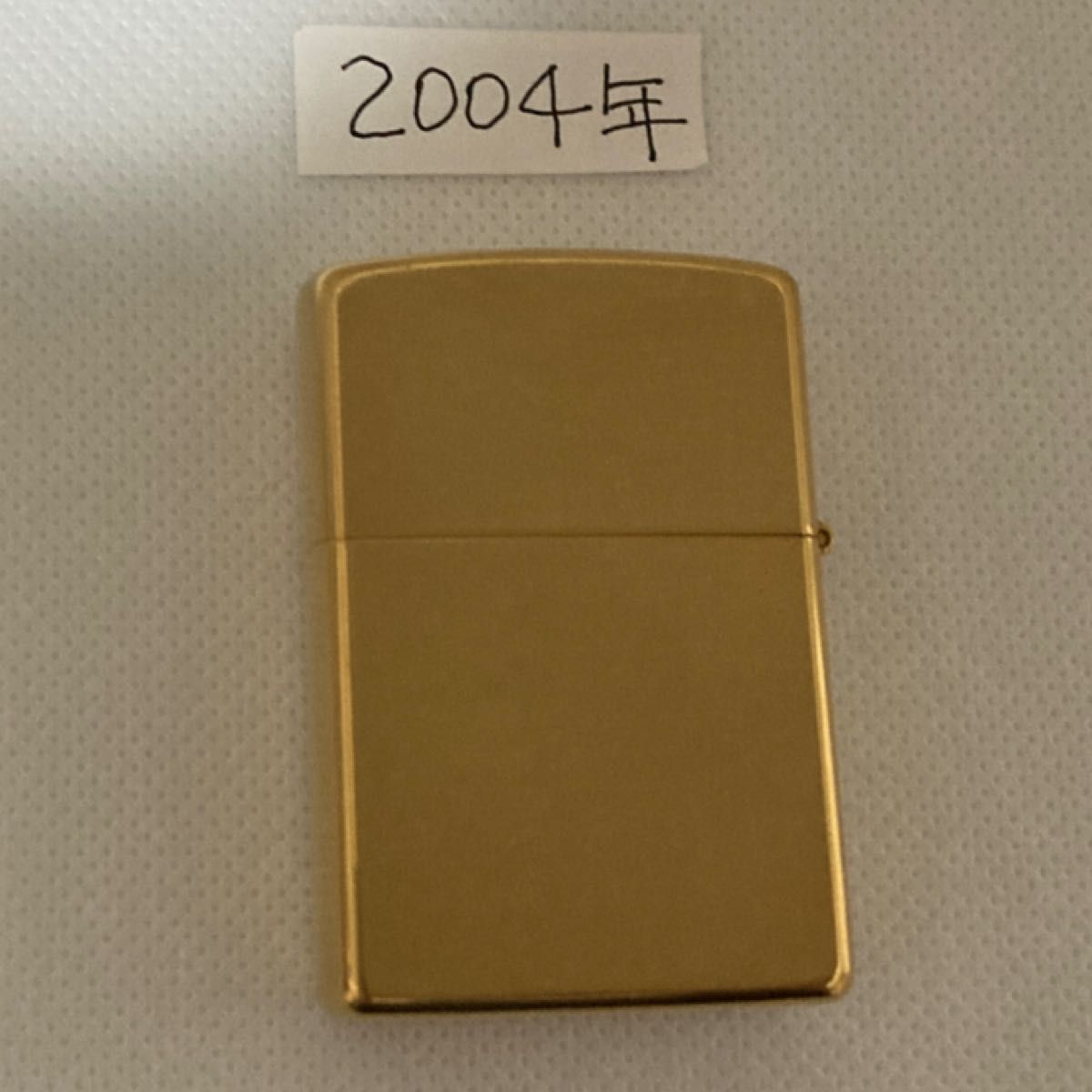 ZIPPOライター　沖ぱち　KYORAKU  SOLID BRASS  未使用　極美品　鏡面　箱付き　2004年製