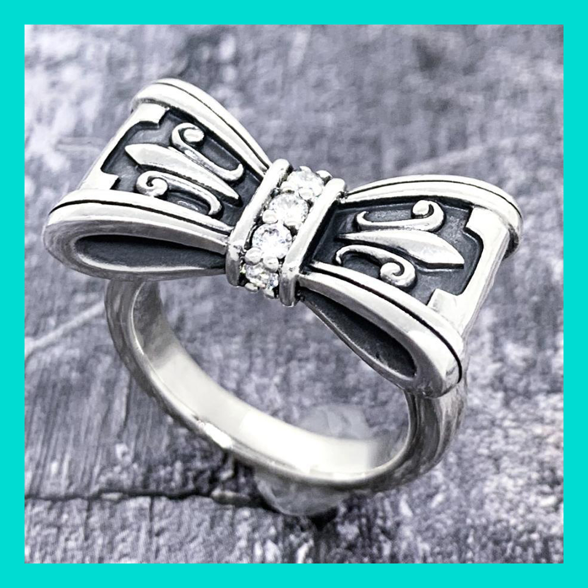 定価2.9万 Justin Davis（ジャスティンデイビス）ジルコニア装飾リボンリング 指輪「PROMISEリング」SRJ328（クリア・7号）