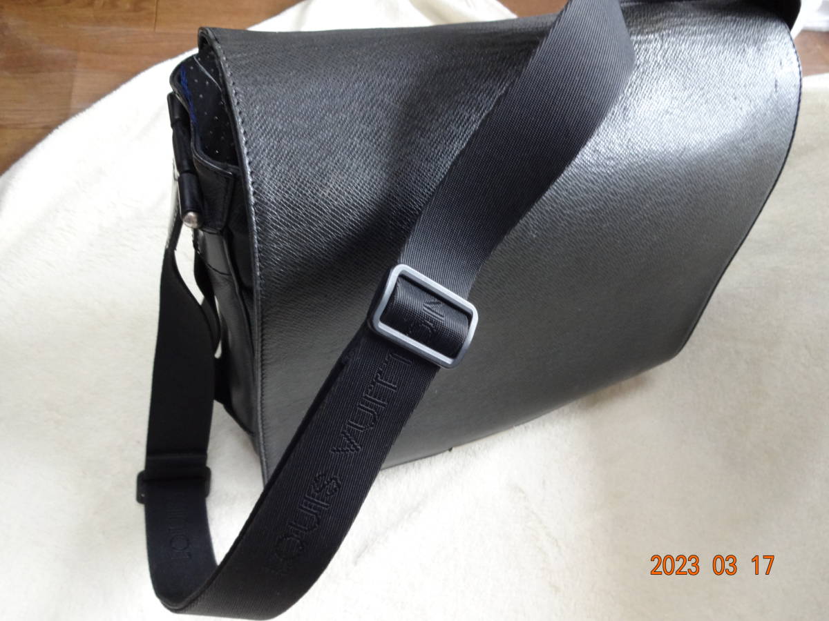 Sold at Auction: Louis Vuitton Canvas Taiga Leather Viktor Messenger Bag