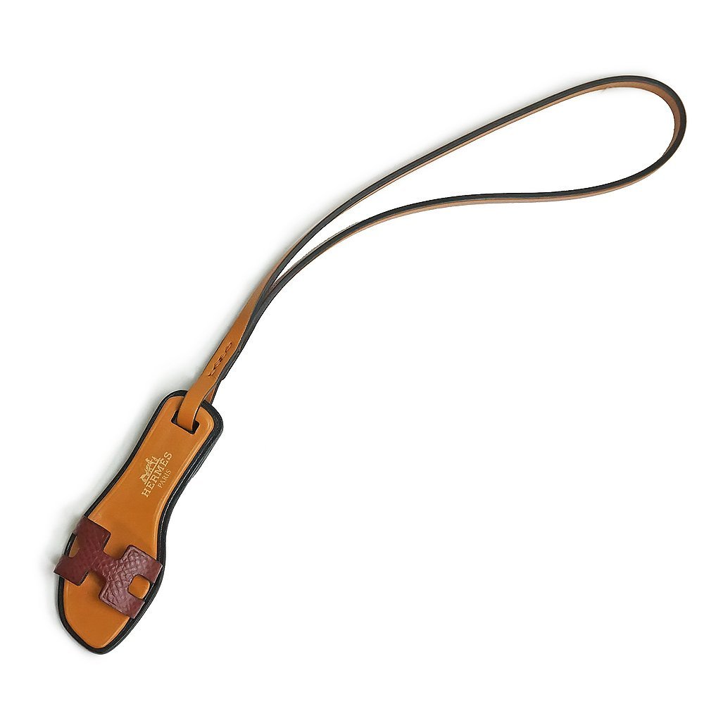 新品・未使用品)エルメス HERMES オラン ナノ サンダルモチーフ
