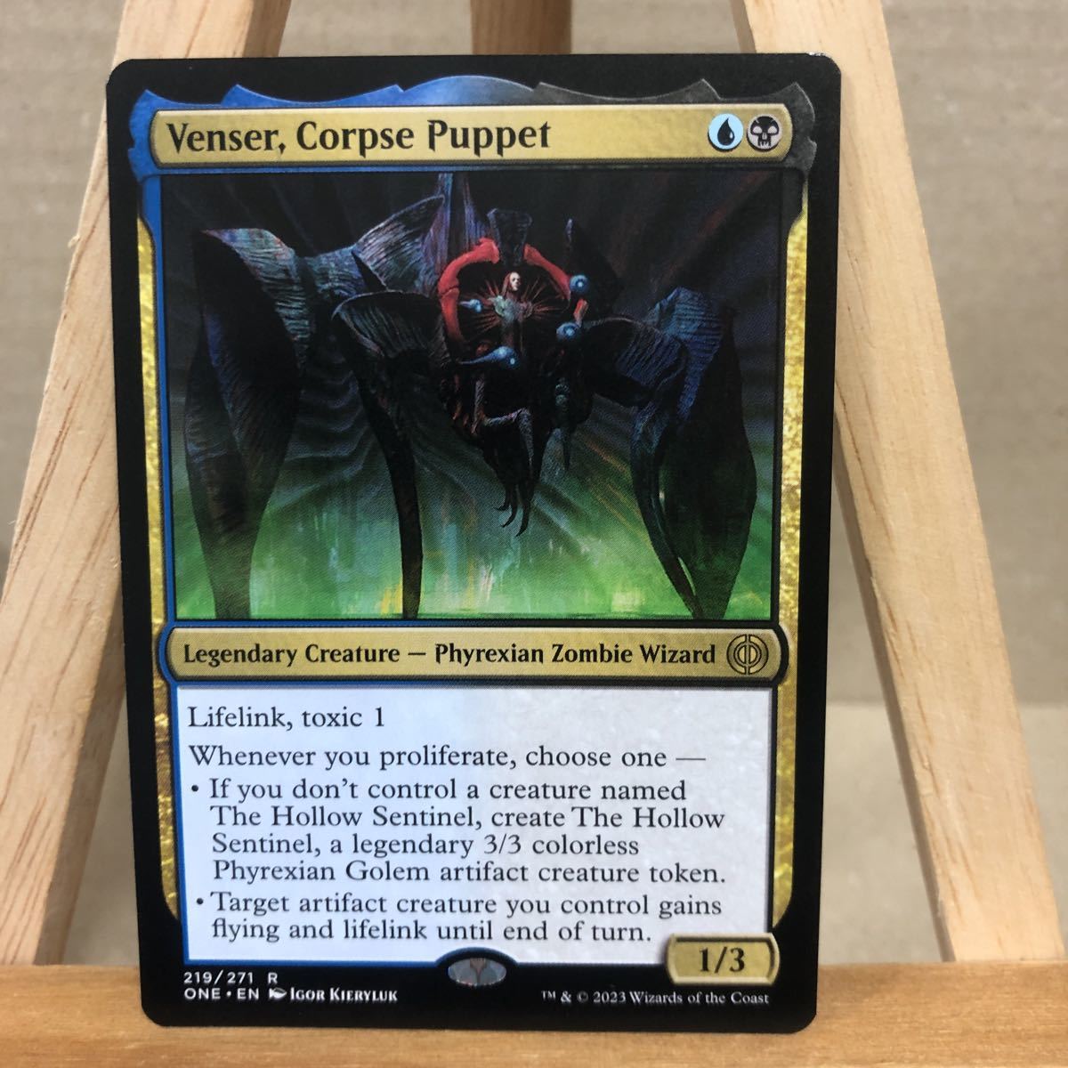 MTG 《死体傀儡、ヴェンセール/Venser, Corpse Puppet》(219)[ONE] 金R 英語版 ファイレクシア：完全なる統一 マジックザギャザリング_画像1