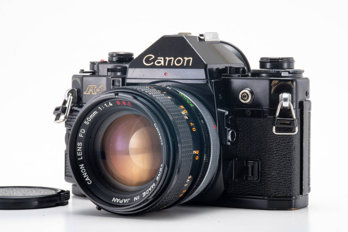 最安値】 #129 CANON A-1 35mmフィルムカメラ w/ 旧FD F1.4/50mm S.S.C
