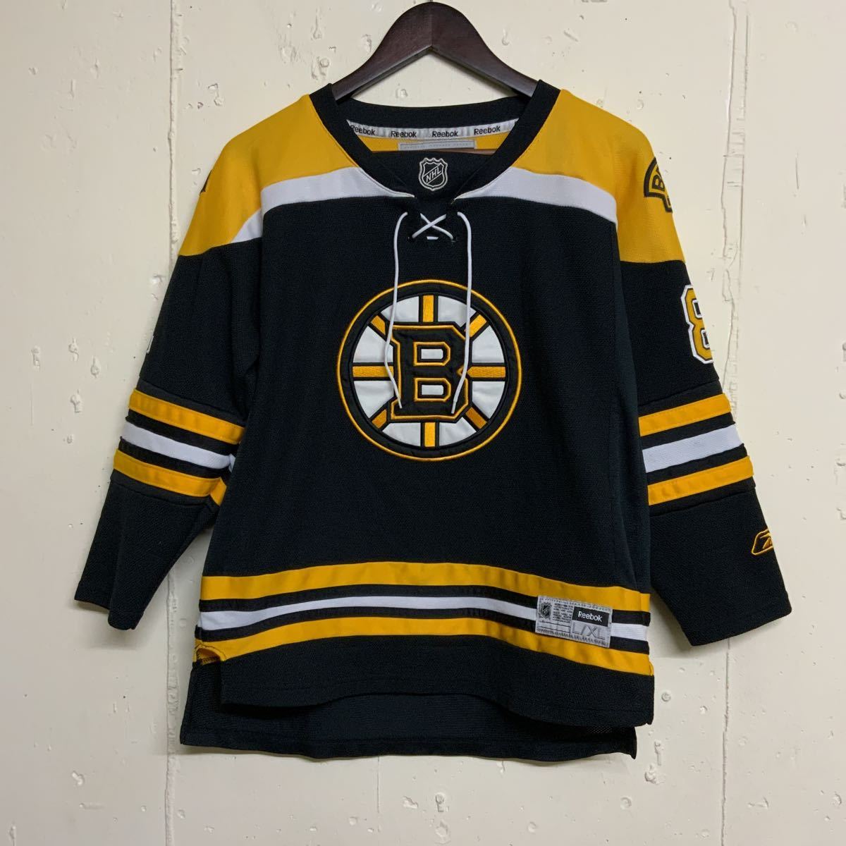 NHLアイスホッケーシャツユニフォームボストンブルーインズCCM古着YOUTH L/XL