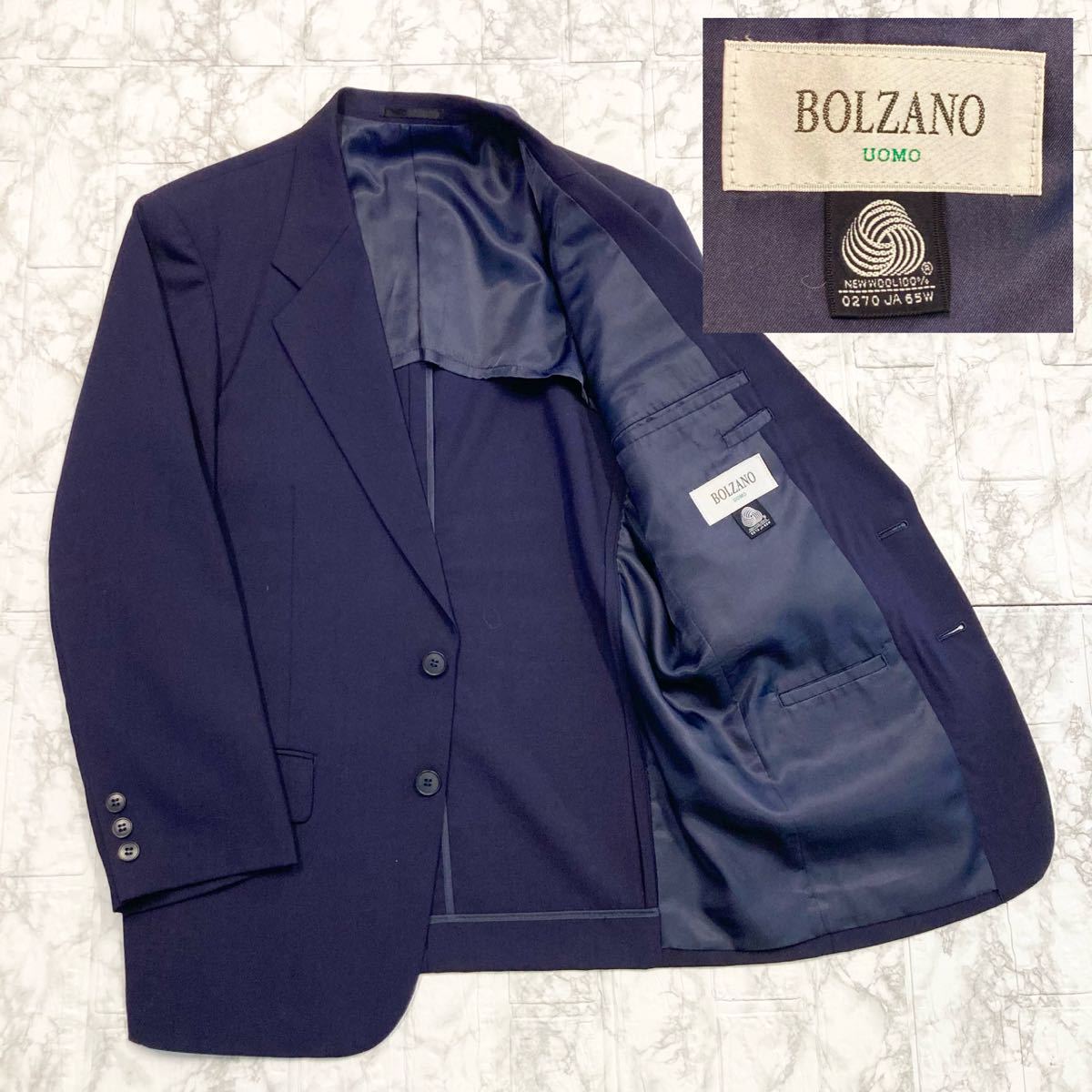 美品　BOLZANO ボルツァーノ　スーツ　日本製 超撥水加工　ネイビー　2B ウール100% 背抜き　春夏　紺　ツータック