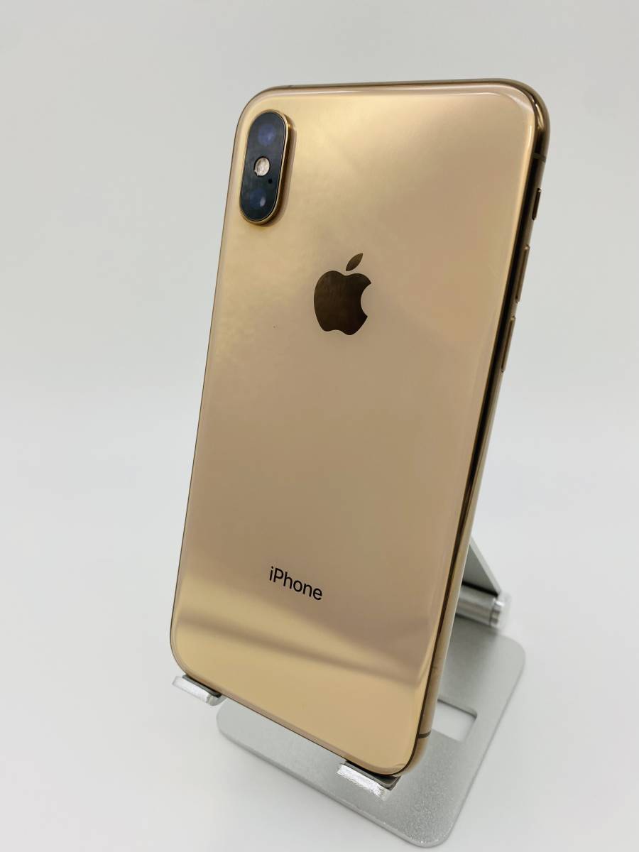 iPhoneXS 64GB au ゴールド 新品バッテリ－ 専用フィルム付き-