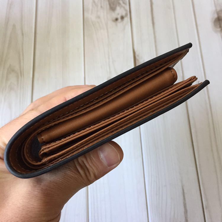 新作品 黒/赤 数量限定 無くなり次第終了 ドイツタンナーの本革 牛革 二つ折り財布 小銭入れ コンパクト 大人気商品 新作品 黒/赤 数量限定 無くなり次第終了 ドイツタンナーの本革 牛革 二つ折り財布 小銭入れ コンパクト 大人気商品