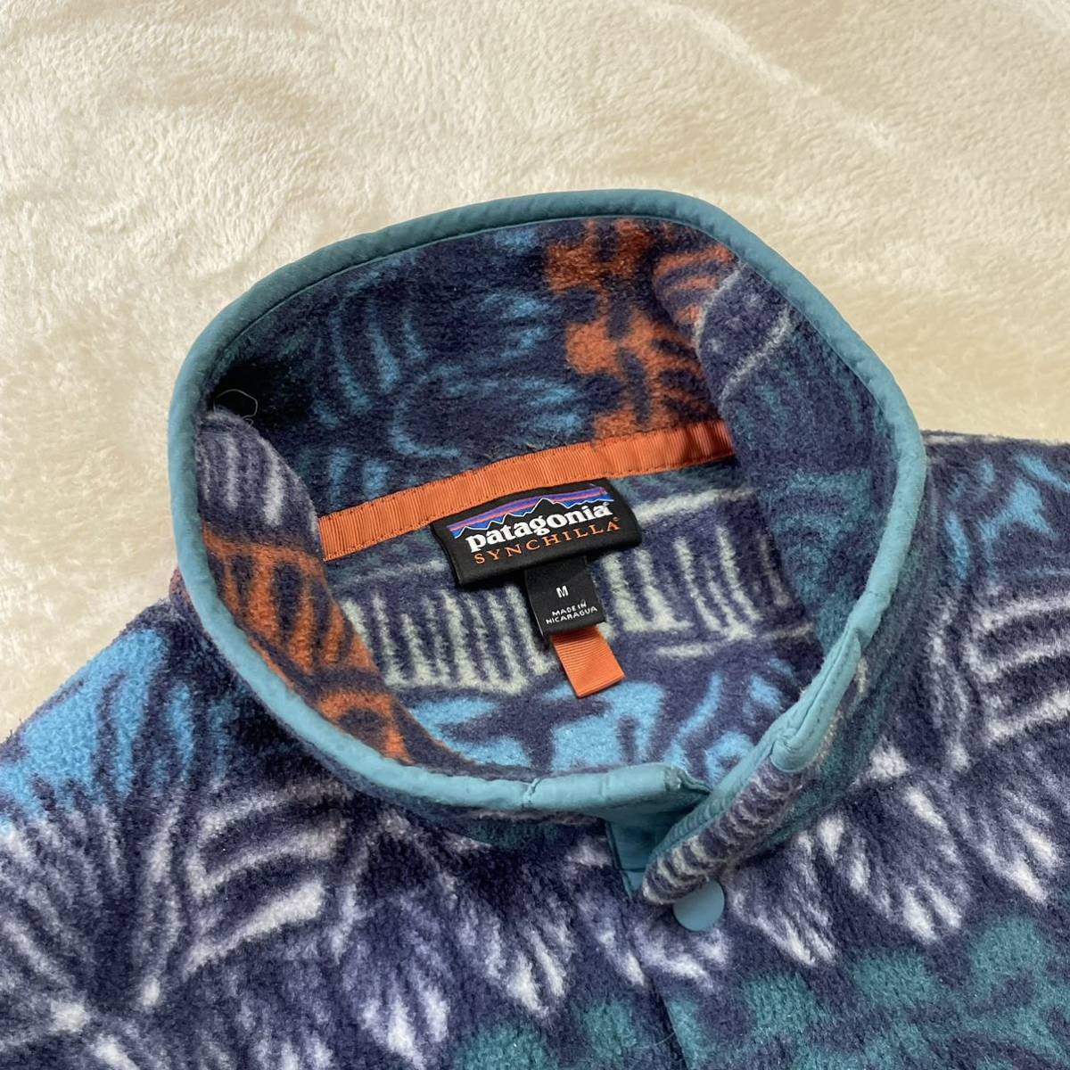 美品☆patagonia 2019年製シンチラスナップ T TBST【M】サイズ フリースプルオーバージャケット パタゴニア 古着 総柄 ネイティブ柄 