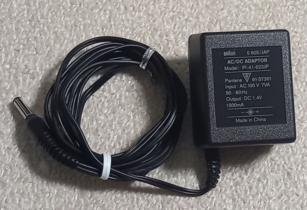 #値下げ AC/DC電源充電アダプタ PI-41-623JP DC1.4V 1500mA 中古品