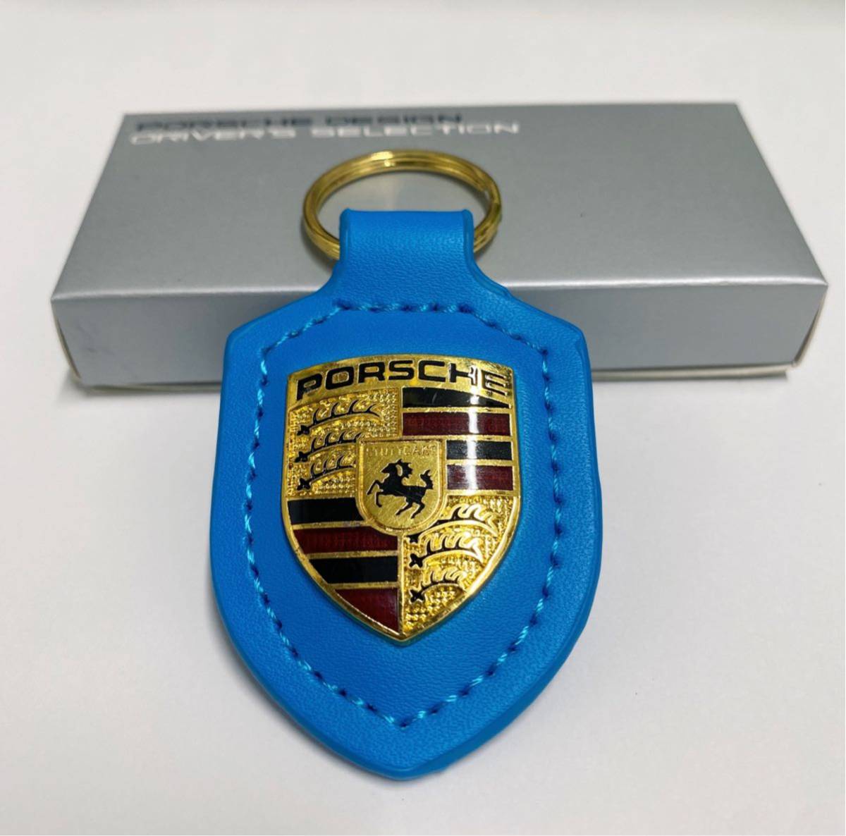 PORSCHE ポルシェ クレスト キーホルダー　水色_画像1