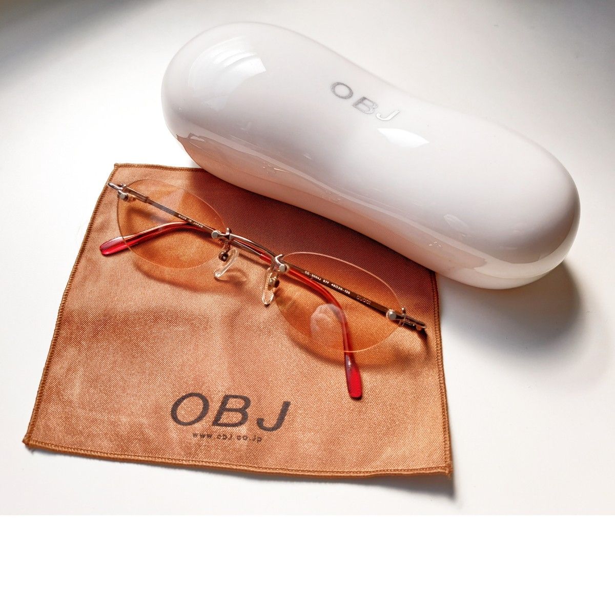 GUCCI EYEWEAR リムレス スクエアフレーム シルバートーン