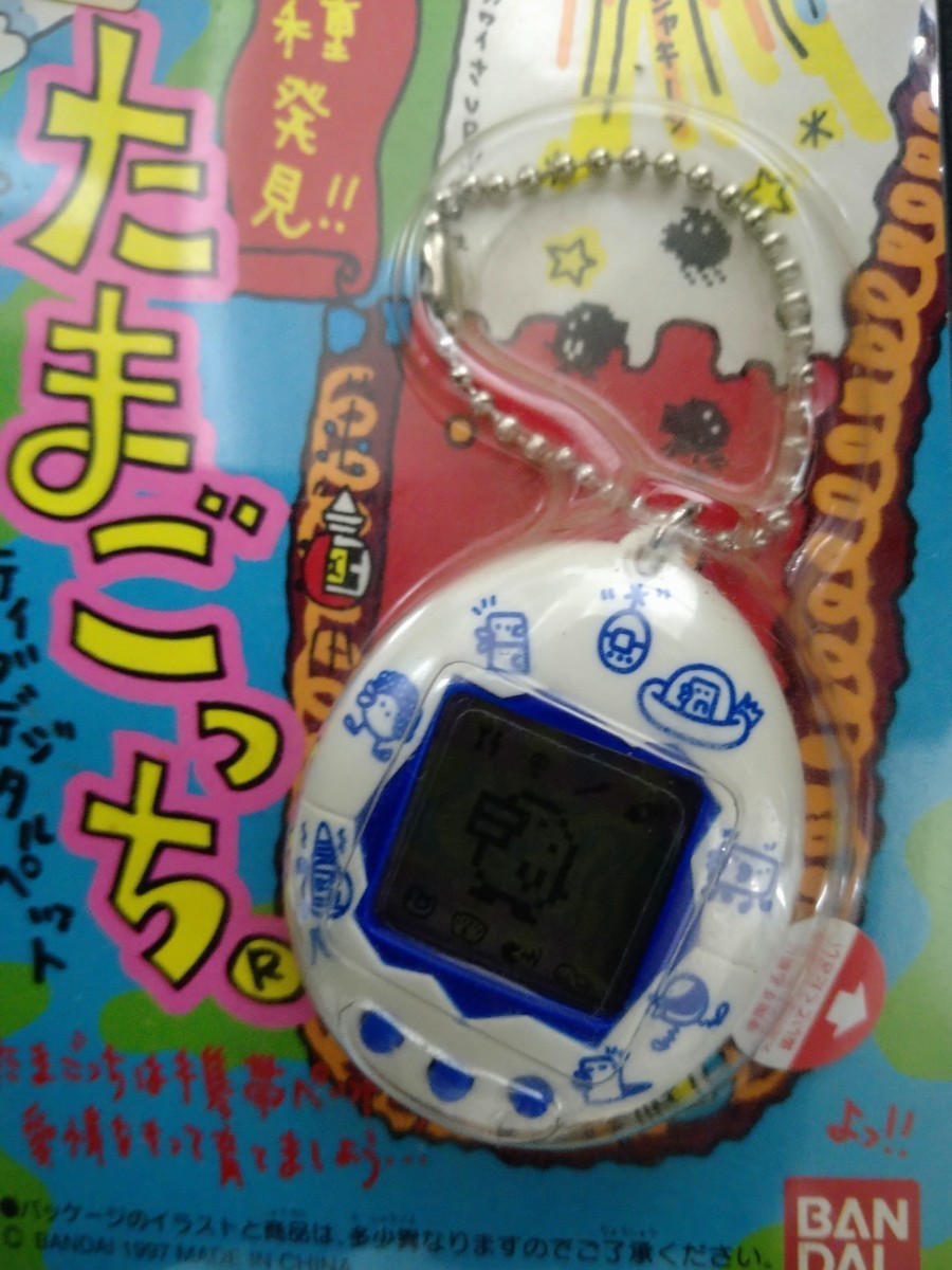 【未開封 新品 未使用 たまごっち TAMAGOTCH】ホワイト柄 白(ブルー文字) 新種発見 たまごっち 1997年 当時物 BANDAI_画像1