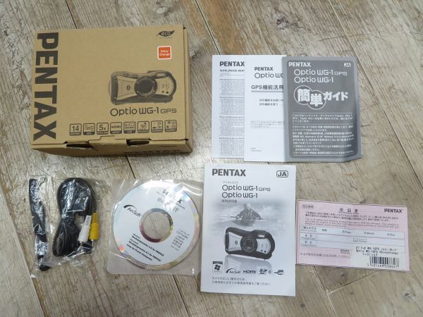 【長期保管品/D0326】 PENTAX/ペンタックス optio WG-1/本体カメラなし 「 箱/取説/ストラップ/AVケーブル/ソフトウエア CD-ROM ほか」_画像1