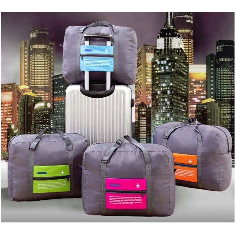 オレンジ色 キャリーオンバッグ 折りたたみバッグ ポケッタブル トラベルバック ボストンバッグ スーツケース 固定可 大容量 32L機内持込可_画像5