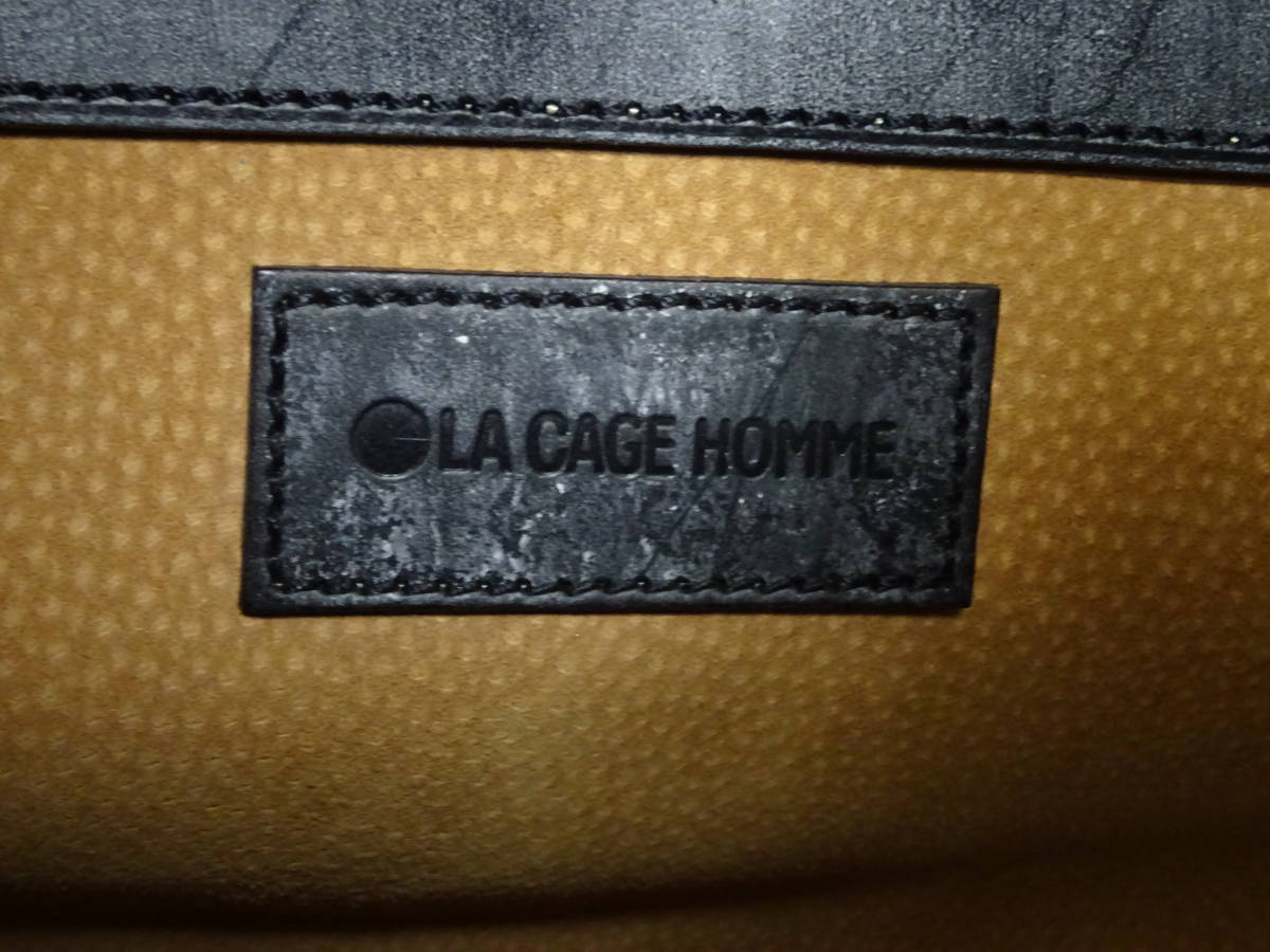 LA CAGE HOMMEla car ju Homme b ride ru leather Dulles bag business bag document bag key, brush, storage bag attaching 