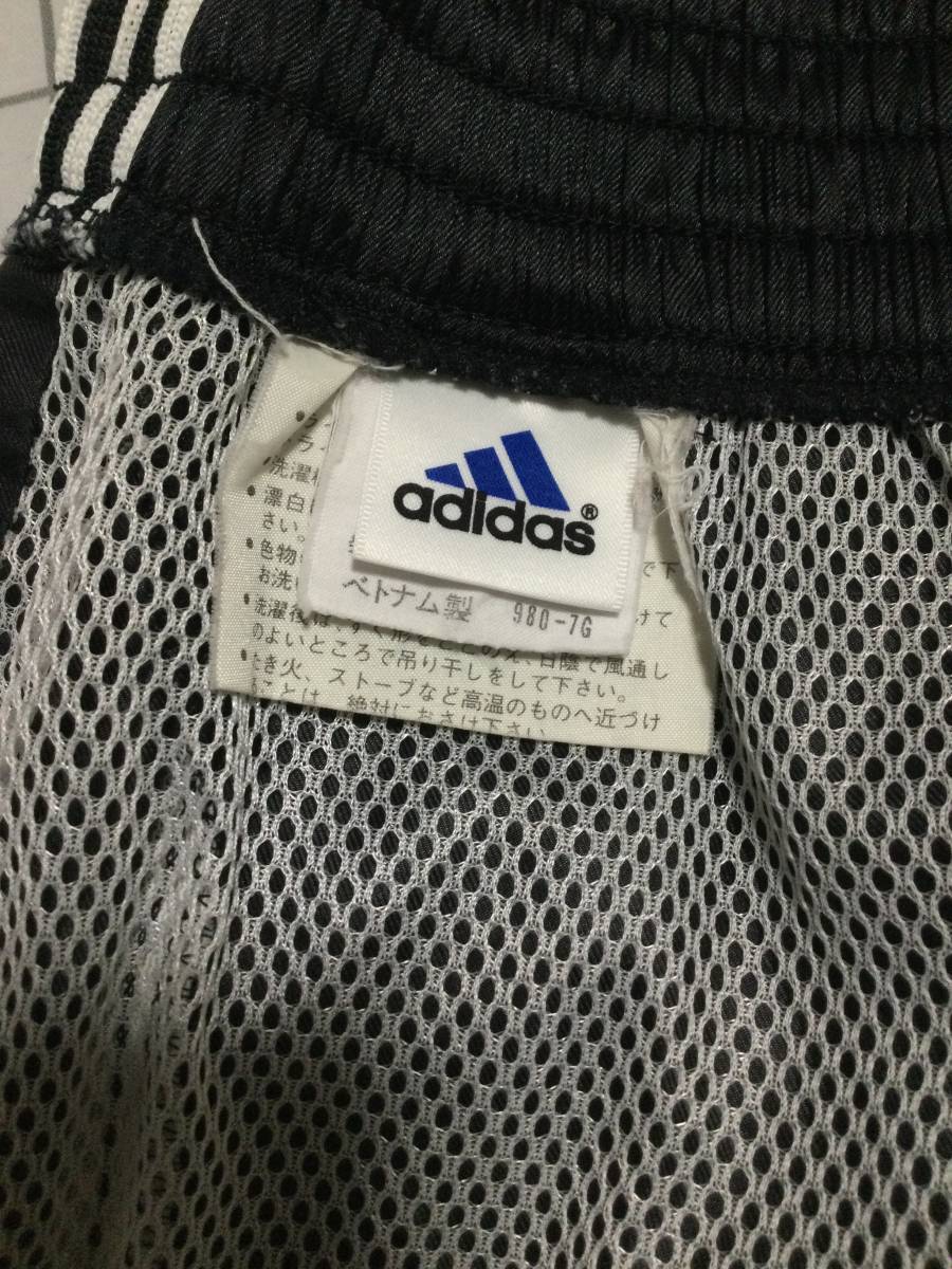 adidas Adidas нейлон длинные брюки Descente производства Vintage size M черный в хорошем состоянии 