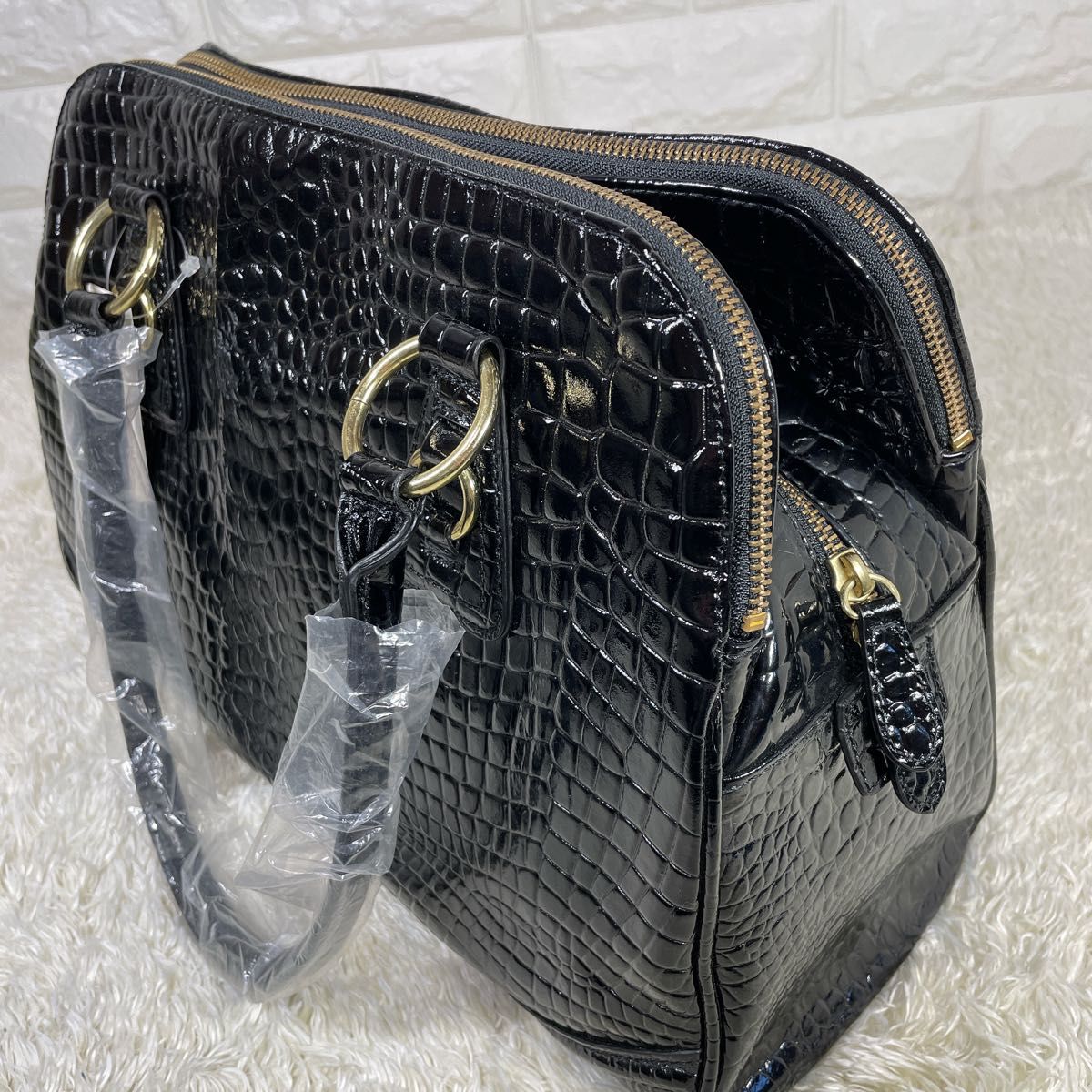 牛革クロコ型押しブロンズのナップサック 牛革クロコ型押しブロンズのナップサック - メルカリ