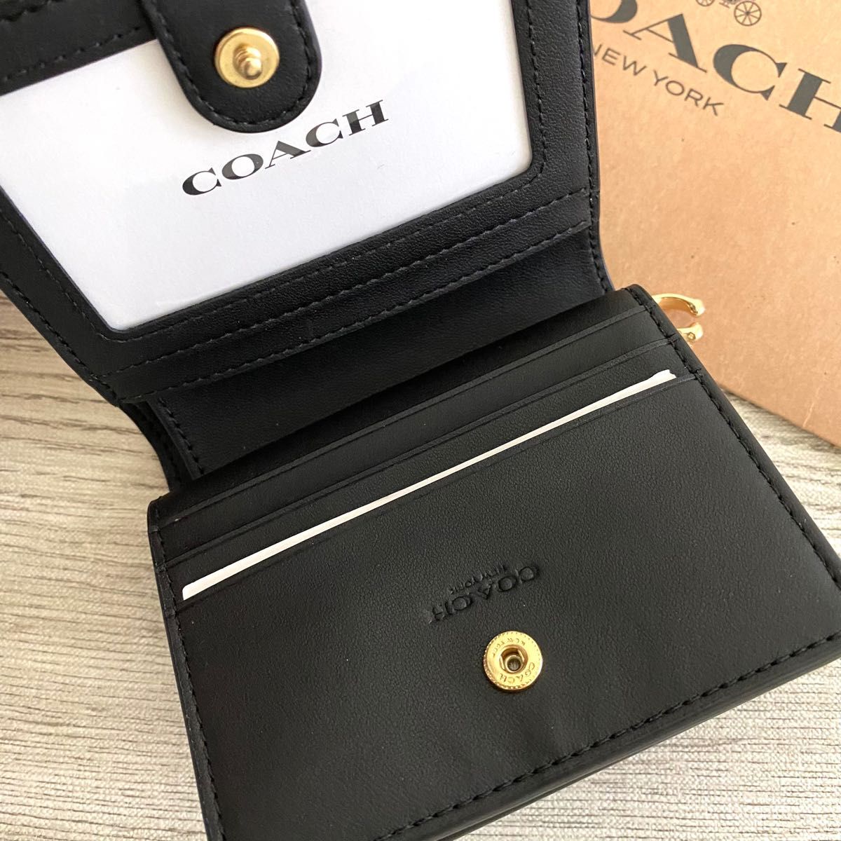 新品》COACH メンズ ブラウン シグネチャー レザー 折り財布|PayPayフリマ