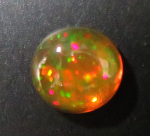 2618 ファイアーオパール ルース 2.06ct 橙透明の地色に赤.緑の遊色 メキシコ : 瑞浪鉱物展示館 【送料無料】_画像1