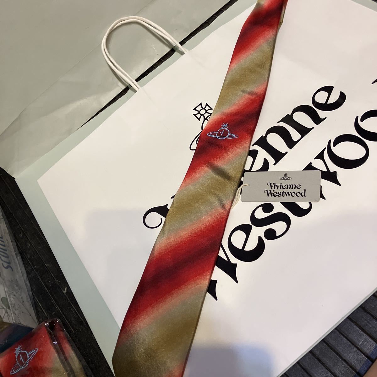 送料込●新品●価-20900円Vivienne Westwood イタリア製 ネクタイ 橙⑤ シルク100% 剣先8.5㎝ ヴィヴィアンウエストウッド ビビアン