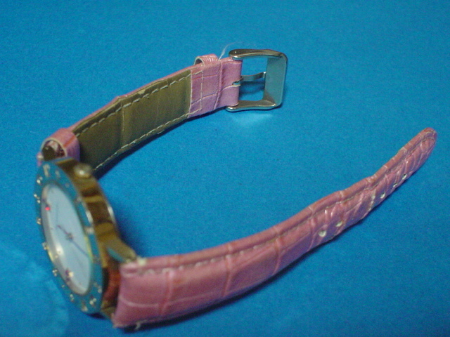 PERSONS. wristwatch pink band 