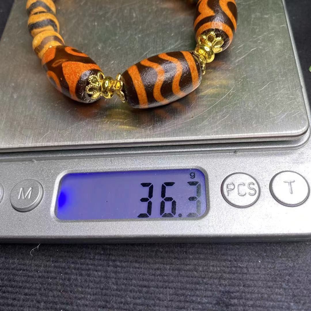 限界価格!極希少 青ke米 火供養黒橘肉亀甲長寿紋 天地天珠 水紋天珠 虎牙三眼天珠ブレスレットお守り 厄除け 魔除け 開運 風水