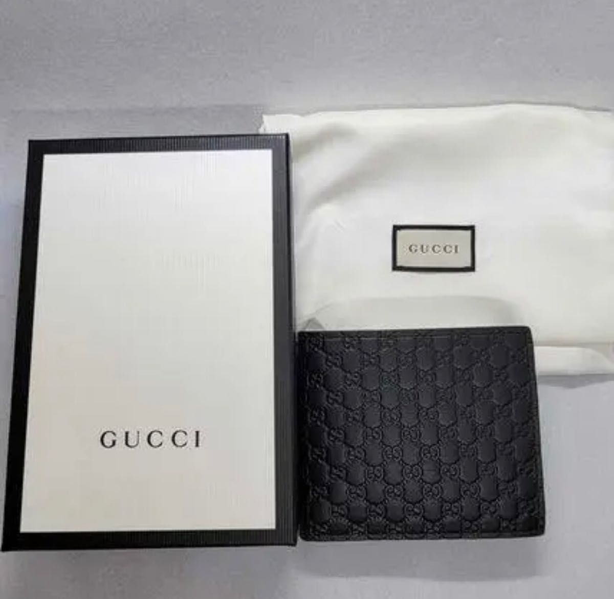 待望の再販! GUCCI グッチ 2つ折り グッチシマレザー 男女 黒 GUCCI