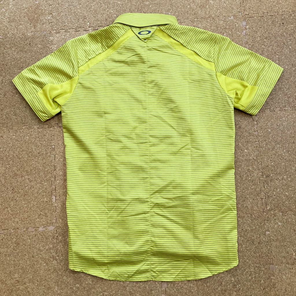 【美品】オークリー　Oakley シャツ 半袖シャツ　ゴルフウェア　ゴルフ　ゴルフシャツ　Lサイズ　メンズ　黄色　OAKLEY スカル　ドクロ