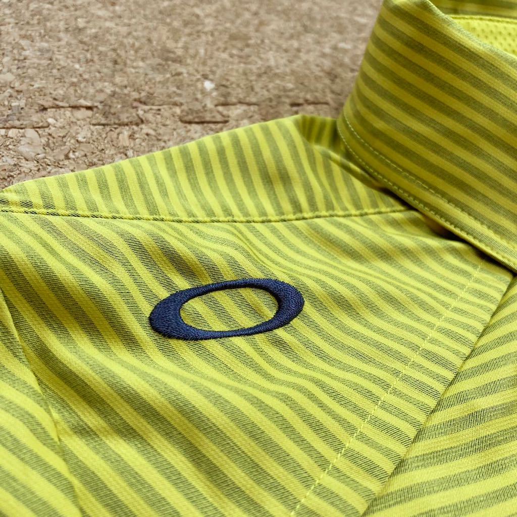 【美品】オークリー　Oakley シャツ 半袖シャツ　ゴルフウェア　ゴルフ　ゴルフシャツ　Lサイズ　メンズ　黄色　OAKLEY スカル　ドクロ