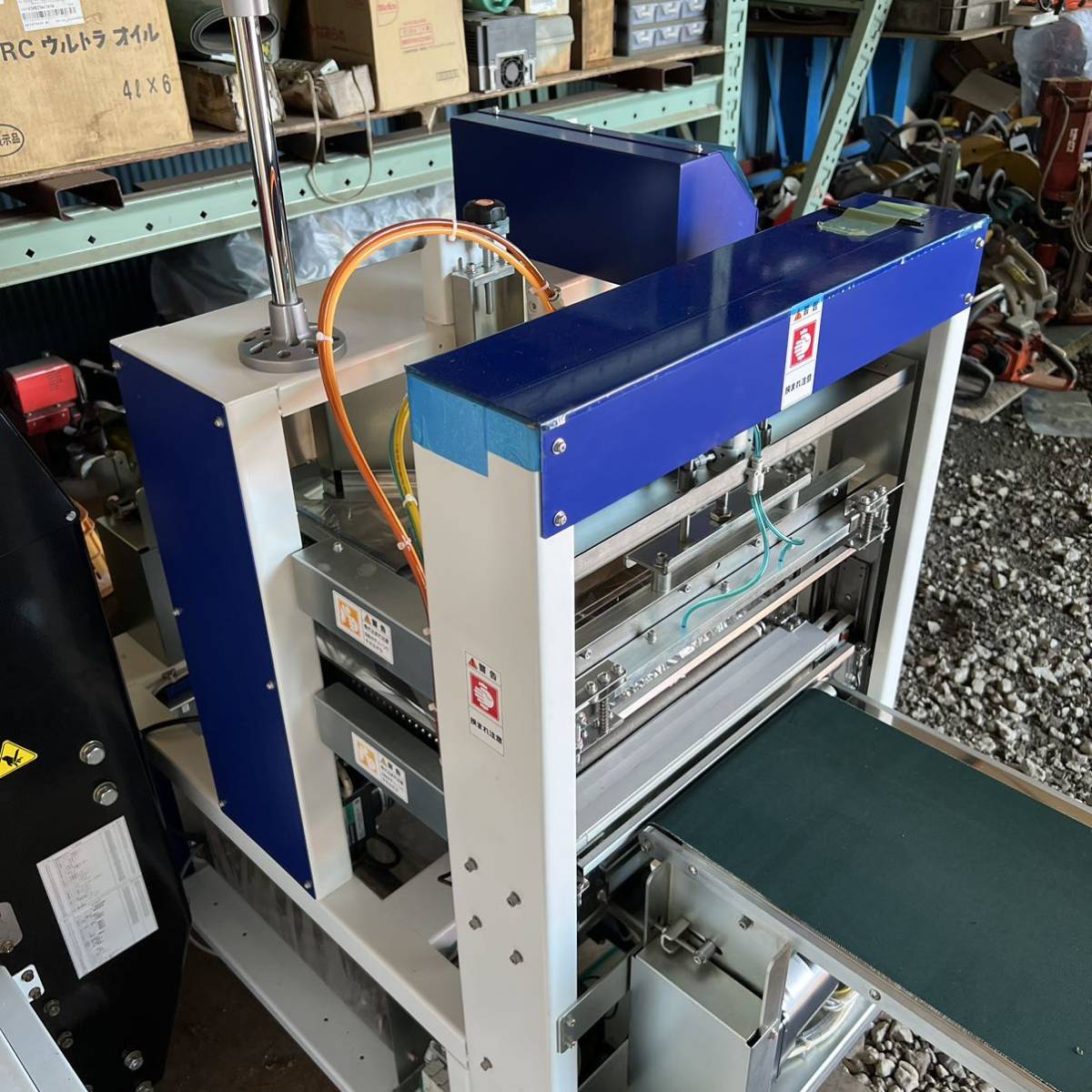 クリーニング機械 3方片開き全自動平面包装機 日本シーリング クリーニング機械 3方片開き全自動平面包装機 日本シーリング
